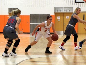 Thunder Forward Meredith Cherne dribbling the basketball during a game