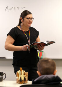 Maria DeFoe teaching young children